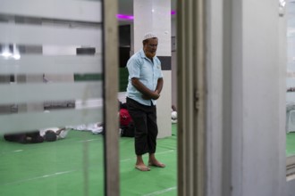 Hajj pilgrim offer prayers Hajj Musafir Khana before leaving to the airport, in Guwahati, India on