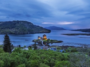 Night over Eilean Donan Castle and Loch Duich from a drone, Isle of Skye, Highlands, Scotland,