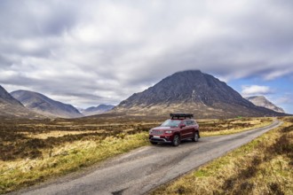 4x4 cars in Glen Etive Valley, Highlands, Scotland, UK