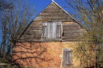 Abandoned and derelict farmhouses on undeveloped land in Rügen, Mecklenburg-Vorpommern, Germany,