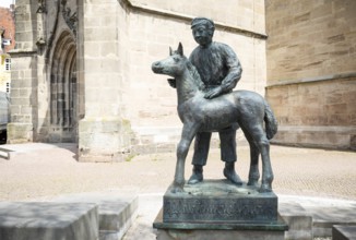 Figure on the horse fountain by Herbert Blaschke next to St Servatius Church, Duderstadt, Lower