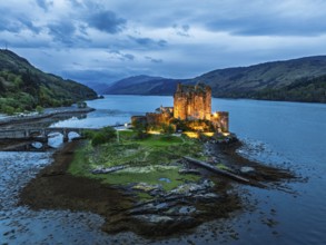 Night over Eilean Donan Castle and Loch Duich from a drone, Isle of Skye, Highlands, Scotland,