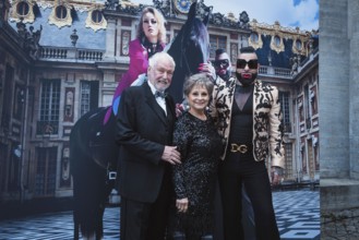 Dr Klaus Lenk, Dagmar Frederic and Harald Glööckler in front of a dinner by star designer Harald