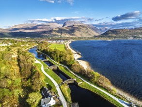 View of Caledonian Canal, Caol Beach and Nevis Range Mountains from a drone, Corpach, Fort William,