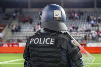 Police officer in combat gear Football stadium