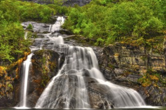 Waterfall in Long Exposure in the Forest in Valle Maggia, Ticino, Switzerland, Europe