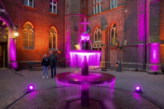 Kevelaer in the light, light installation inner courtyard of the confessional chapel with fountain