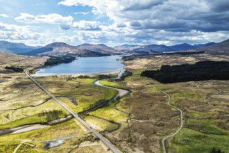 Mountains and Moors over Loch Tulla and River Orchy from a drone, Highlands, Scotland, UK
