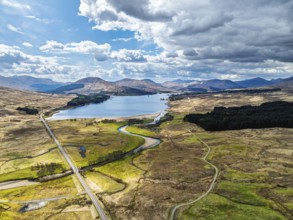 Mountains and Moors over Loch Tulla and River Orchy from a drone, Highlands, Scotland, UK