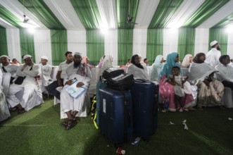 Hajj pilgrims arrives at Hajj Musafir Khana to collect Visa before leaving to the airport, in