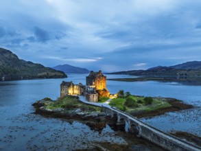 Night over Eilean Donan Castle and Loch Duich from a drone, Isle of Skye, Highlands, Scotland,