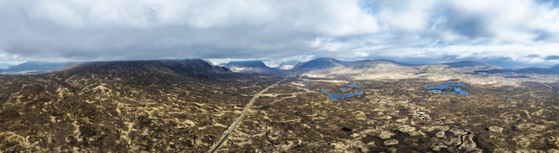 Panorama of Moors and Road A82 over Glencoe Valley from a drone, Highland, Scotland, United