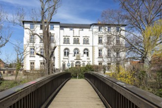 Park view of Lützschena Castle over the castle bridge, Leipzig, Saxony, Germany, Europe