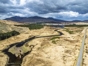 Mountains and Moors over Loch Tulla and River Orchy from a drone, Highlands, Scotland, UK