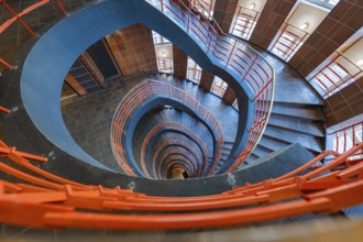 Spiral staircase with red banisters, vertical view downwards, SPRINKENHOF, Hamburg, Germany, Europe