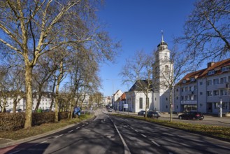 Friedenskirche Saarbrücken, bare trees, apartment buildings, street, blue sky, cloudless,