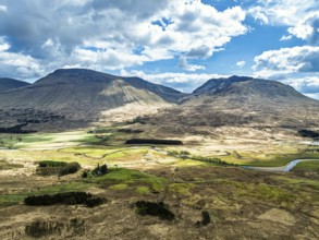 Mountains and Moors over Loch Tulla and River Orchy from a drone, Highlands, Scotland, UK
