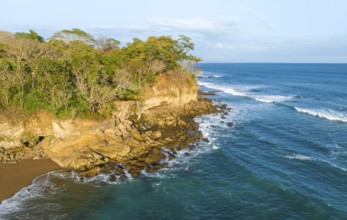 Aerial view, rainforest, sandy beach and coast with waves, Playa Cocalito, Puntarenas, Costa Rica,