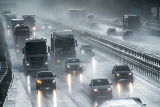 A2 motorway, at Recklinghausen motorway junction, heavy traffic during a thunderstorm, North