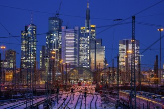 Railway tracks in front of the main railway station in Frankfurt am Main, skyline of skyscrapers in