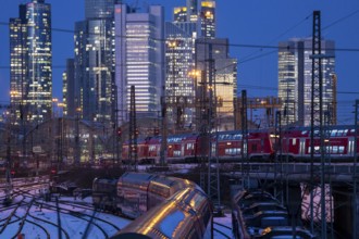 Railway tracks in front of the main railway station in Frankfurt am Main, skyline of skyscrapers in