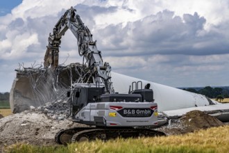 Demolished tower of a 20 year old wind turbine, in the Werl wind farm, 5 old Enercon E-66 turbines
