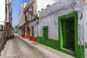 Small alley with colourful house facades, Rota, Andalusia, Spain, Europe