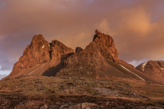 Morning light and clouds over steep mountains and rocks, Eystrahorn, East Iceland, Iceland, Europe