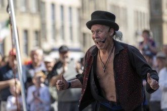 Street performers at a performance, world's largest cultural festival The Fringe, High Street,