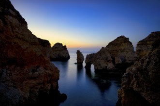 Coloured cliffs and sunrise, rocks in the sea, Ponta da Piedade, Lagos, caves, cliffs, Atlantic