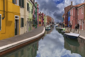 Colourful houses on the canal in Burano, Venice, Italy, Europe