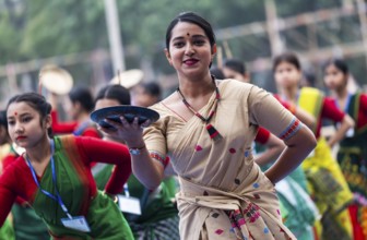 Participants with instructor dance in a Bihu dance workshop ahead of Rongali Bihu Festival, in