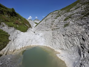 Glacier mill with glacier pots on the Trinser Alp Mora, Trin, Canton Graubünden, Switzerland,