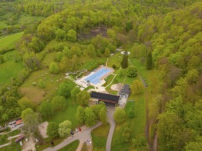 Waldfreibad Eningen unter Achalm, leisure centre with swimming pool surrounded by forest and