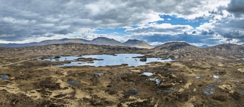 Panorama of Rannoch Moor from a drone over Loch Ba and Loch of the Armpit, A82 Highland Way, Argyll