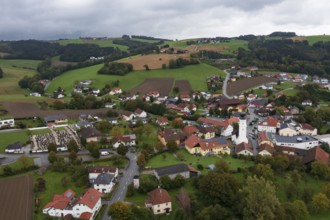 Drone shot, view of village with church, Enzenkirchen, Innviertel, Upper Austria, Austria, Europe
