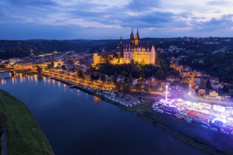 Albrechtsburg Castle and hustle and bustle on the Elbe for the wine festival, night shot from