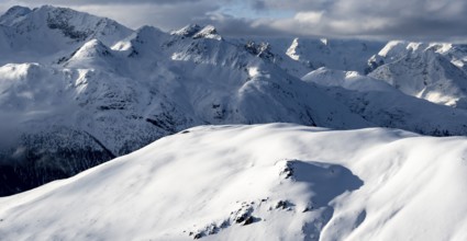 Snow-covered Alps, winter landscape in the mountains, Albula Alps, Grisons, Switzerland, Europe