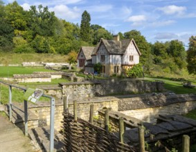 Overview of excavated walls and museum building, Chedworth Roman Villa, Chedworth, Cotswolds,