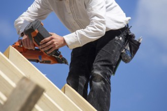 Carpenters working on the roof