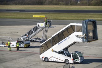 Dortmund Airport, DTM, apron, in front of the terminal, runway, mobile passenger stairs waiting for