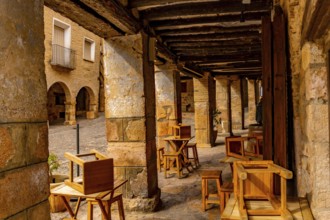 Picturesque Rafael Ayerbe square. Old Plaza Mayor of the Pyrenean town of Alquezar, Huesca, Spain,