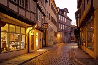 Half-timbered houses in a narrow street with cobblestones, Old Town in the evening, World Heritage