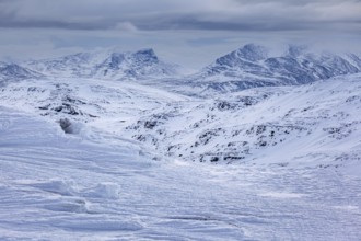 Winter mountain landscape, snow, snow drifts, cloudy, Lapporten, Laponia, Lapland, Sweden, Europe