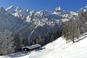 Winter view over the Loutse children's holiday home to the snow-covered Alpine peaks with Grand