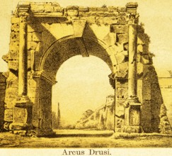 Ruin Arcus Drusi, city gate with lateral columns, part of the fortification, street, ancient Rome,