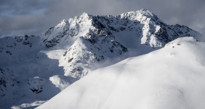 Snow-covered Alps, winter landscape in the mountains, Albula Alps, Grisons, Switzerland, Europe