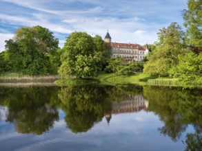 Wiesenburg Castle and Park, reflection in the lake, English landscape park, Wiesenburg, Hoher