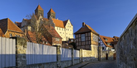 Half-timbered houses in Schenkgasse with St Servatius collegiate church, old town of the World