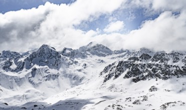 View at the summit of Piz Laviner, mountain panorama in winter, mountain landscape with mountain